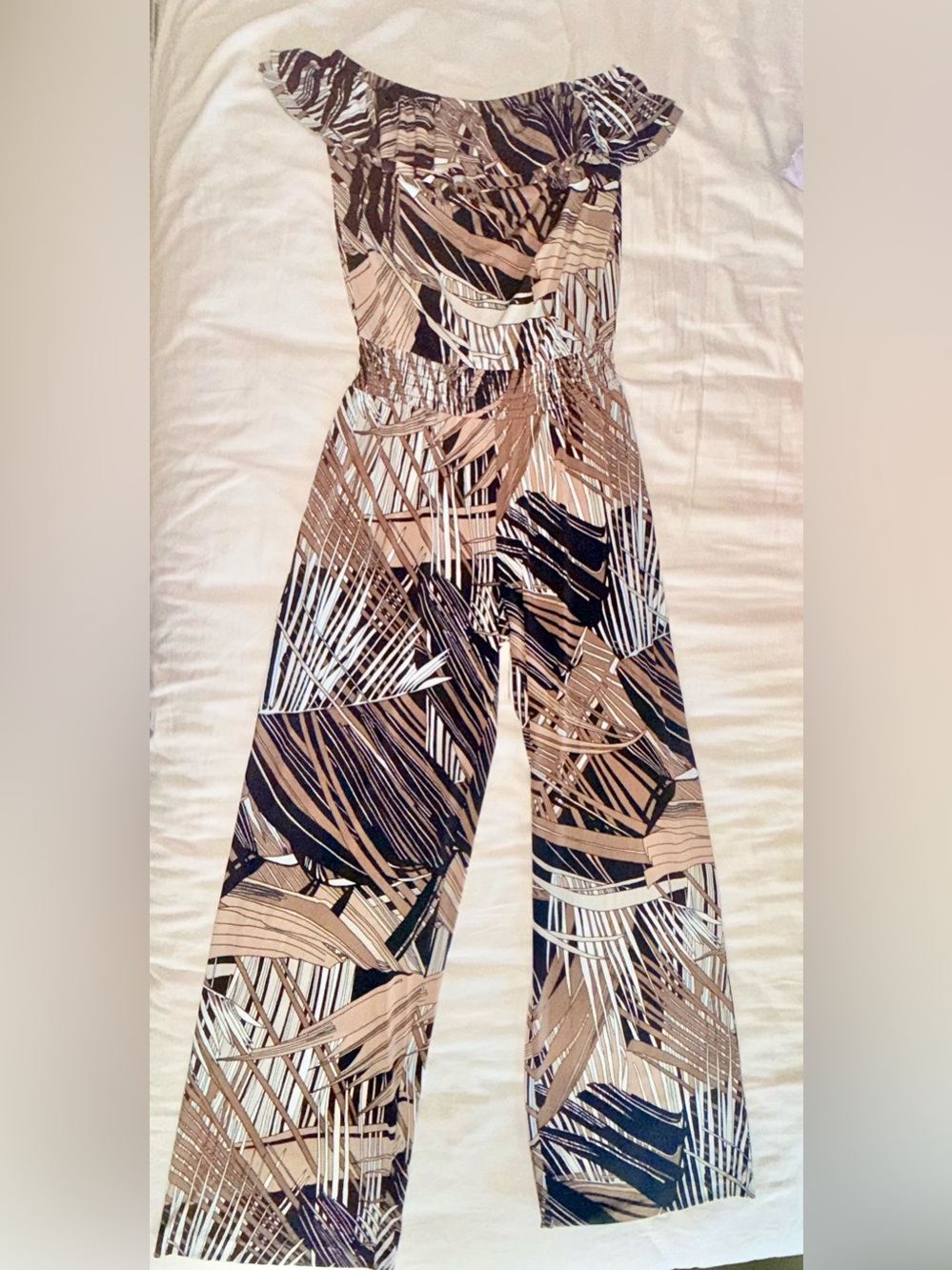 Cache Off-Shoulder Wide-Leg Jumpsuit in Tan, Black, and Cream